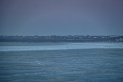 Ледяной закат в Одессе: берега Хаджибейского лимана замерзли (ФОТО, ВИДЕО)