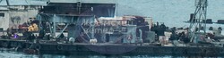 Окупанти піднімають з морського дна залишки свого десантного корабля